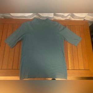 Beautiful green turtleneck.